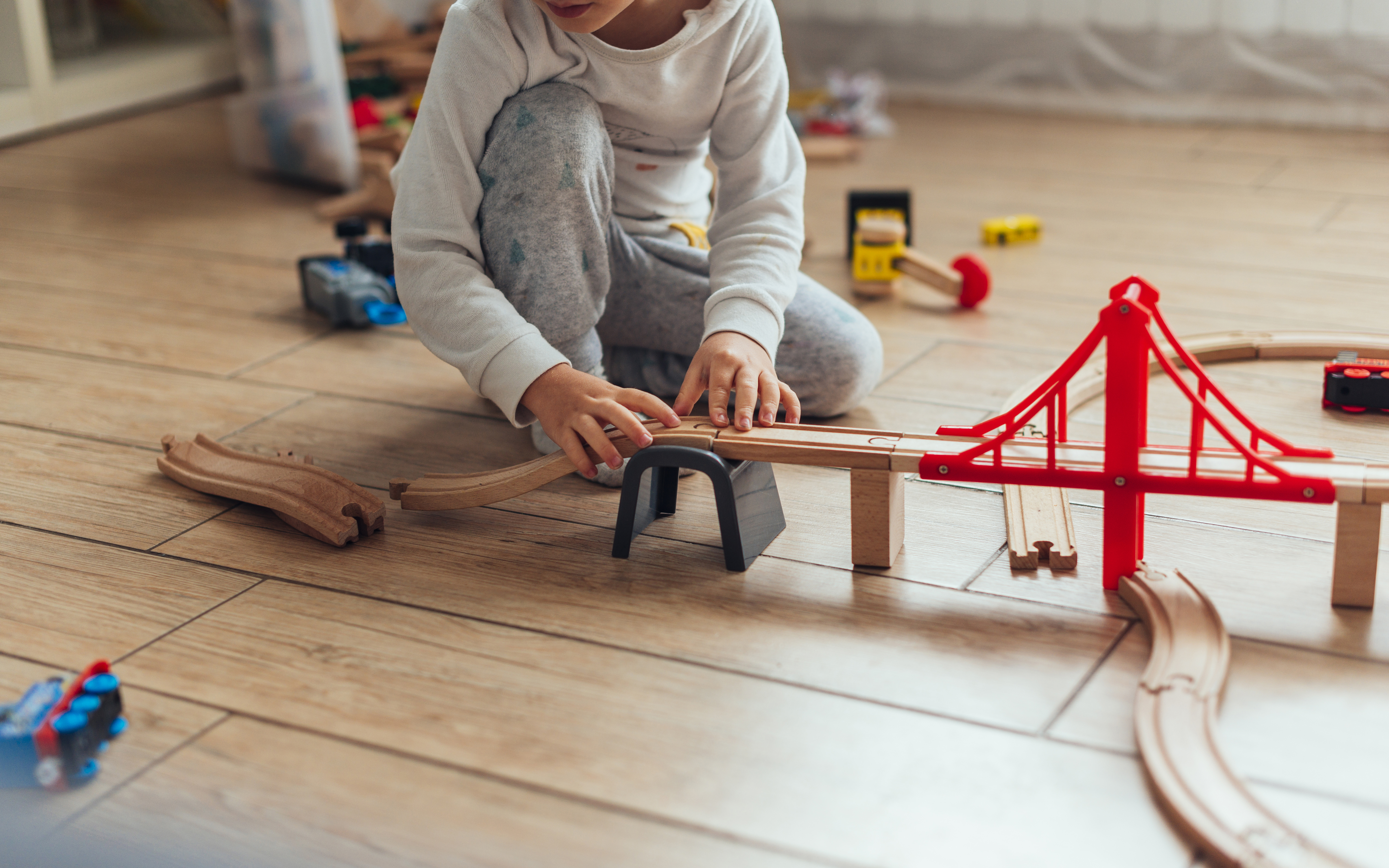 child playing with toys in therapy